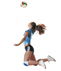 Female volleyball player in air